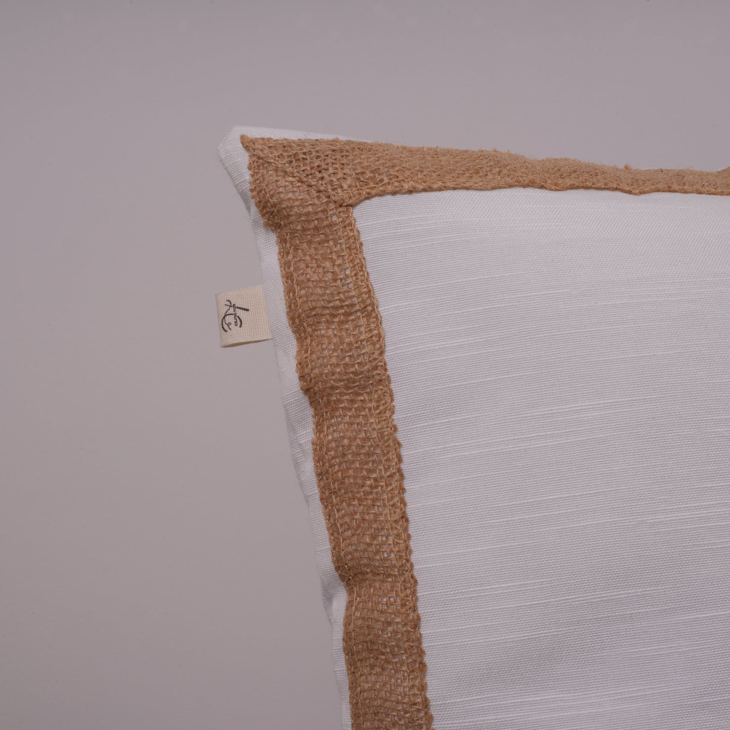 Crystal white jute bordered cushion cover